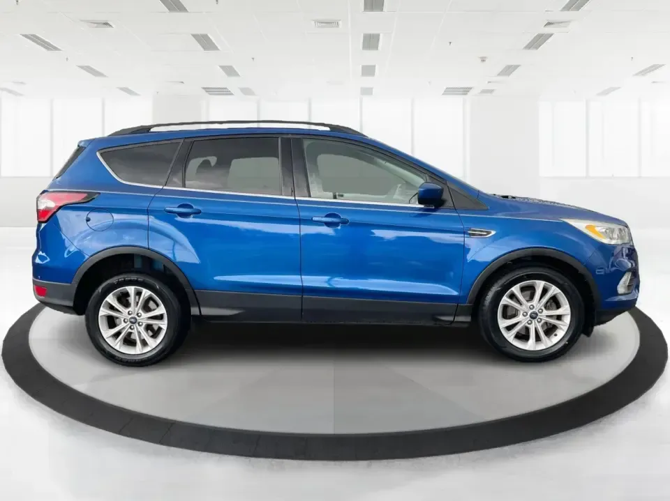 2017 Ford Escape SE (1FMCU0GD5HU) with an 1.5L L4 DOHC 16V engine, 6A transmission, located at 1951 S Dayton Lakeview Rd., New Carlisle, OH, 45344, (937) 908-9800, 39.890999, -84.050255 - **Adventure Awaits in This 2017 Ford Escape SE Perfect for Your Ohio Lifestyle!**<br /> <br /> Are you ready to embrace the open road? Whether you're commuting to work, taking the kids to soccer practice, or planning a weekend getaway to nearby attractions like the National Museum of the U.S. Air F - Photo#1