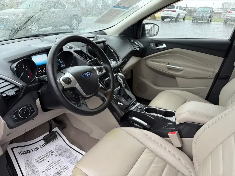 2016 Ford Escape Titanium (1FMCU0J94GU) with an 2.0L L4 DOHC 16V engine, 6-Speed Automatic transmission, located at 8750 N County Rd 25A, Piqua, OH, 45356, (937) 908-9800, 40.164391, -84.232513 - **Explore New Adventures with the 2016 Ford Escape Titanium Perfect for Families and Commuters Alike!**<br /> <br /> Are you ready to elevate your driving experience? The 2016 Ford Escape Titanium is the ideal companion for both bustling family life and daily commutes, bringing together style, comf - Photo#9