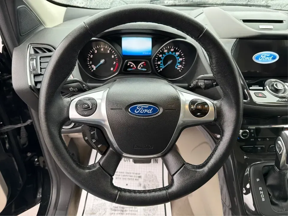 2016 Ford Escape Titanium (1FMCU0J94GU) with an 2.0L L4 DOHC 16V engine, 6-Speed Automatic transmission, located at 8750 N County Rd 25A, Piqua, OH, 45356, (937) 908-9800, 40.164391, -84.232513 - **Explore New Adventures with the 2016 Ford Escape Titanium Perfect for Families and Commuters Alike!**<br /> <br /> Are you ready to elevate your driving experience? The 2016 Ford Escape Titanium is the ideal companion for both bustling family life and daily commutes, bringing together style, comf - Photo#16