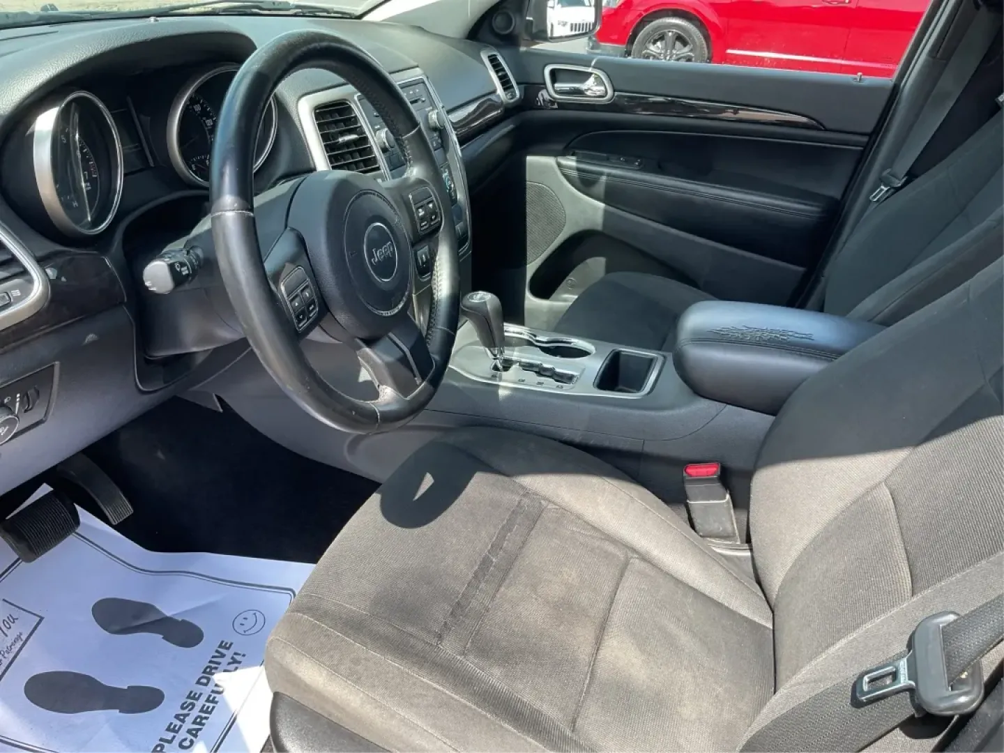 2013 Jeep Grand Cherokee Laredo (1C4RJFAG7DC) with an Other engine, located at 4508 South Dixie Dr, Moraine, OH, 45439, (937) 908-9800, 39.689976, -84.218452 - Are you ready to elevate your driving experience? Whether you're a growing family in need of spacious comfort, a weekend adventurer seeking reliability, or simply someone looking for a dependable daily driver, the 2013 Jeep Grand Cherokee Laredo is the perfect vehicle for you. Located at Advantage C - Photo#9