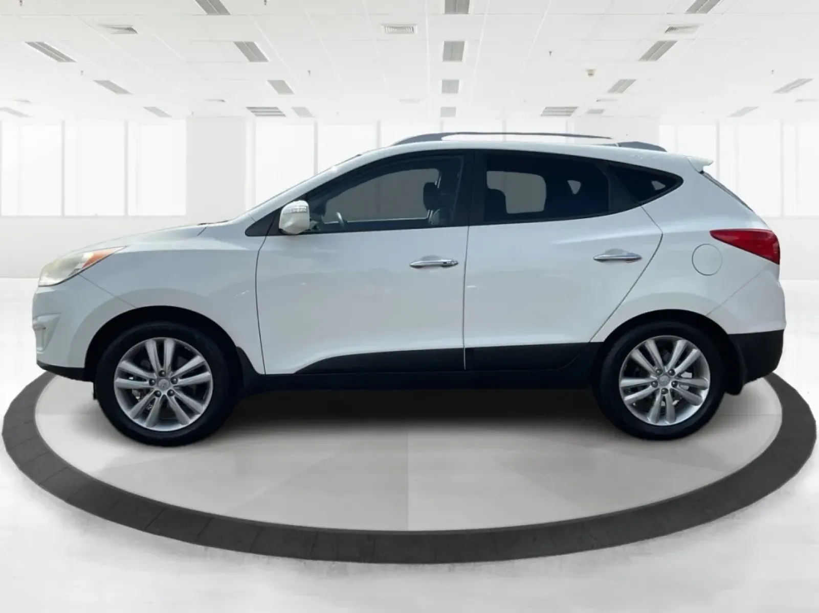 2013 Hyundai Tucson Limited (KM8JU3AC4DU) with an Other engine, located at 1951 S Dayton Lakeview Rd., New Carlisle, OH, 45344, (937) 908-9800, 39.890999, -84.050255 - Are you ready to elevate your daily commute or embark on weekend adventures? The 2013 Hyundai Tucson Limited is the perfect SUV for those looking for reliability, comfort, and style. Ideal for growing families or budget-conscious buyers, this utility vehicle is designed to meet your diverse lifestyl - Photo#5