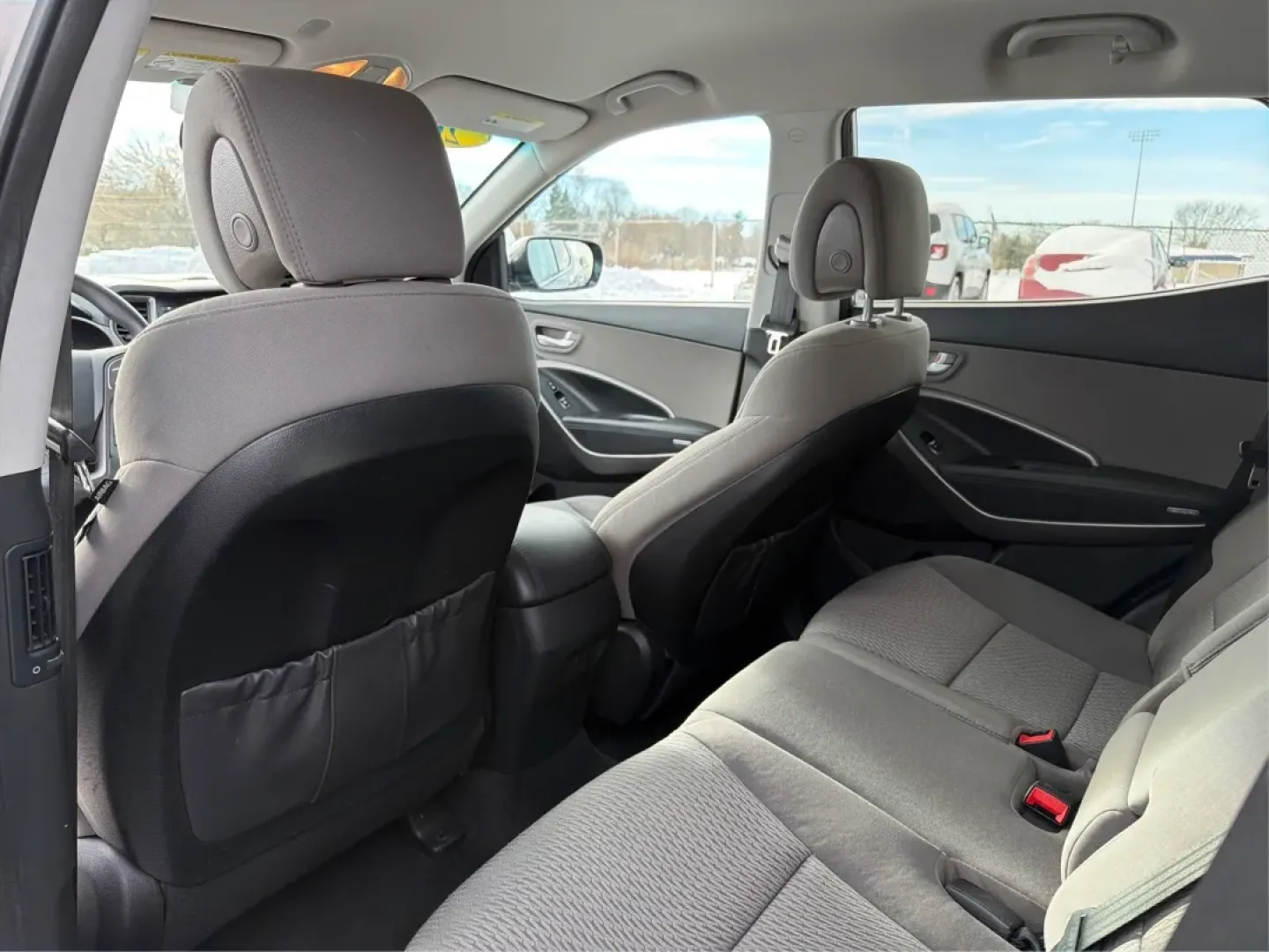 2016 Hyundai Santa Fe 2.4L (5XYZTDLB1GG) with an Theta II 2.4L I-4 gasoline direct injection engine, located at 1099 N County Rd 25A , Troy, OH, 45373, (937) 908-9800, 40.057079, -84.212883 - ### Embrace Your Adventurous Lifestyle with the 2016 Hyundai Santa Fe at Advantage Car and Credit - Troy!<br /> <br /> Are you ready to elevate your weekend escapes or daily commutes? Look no further than this stunning 2016 Hyundai Santa Fe, a versatile SUV designed for those who crave adventure and - Photo#10