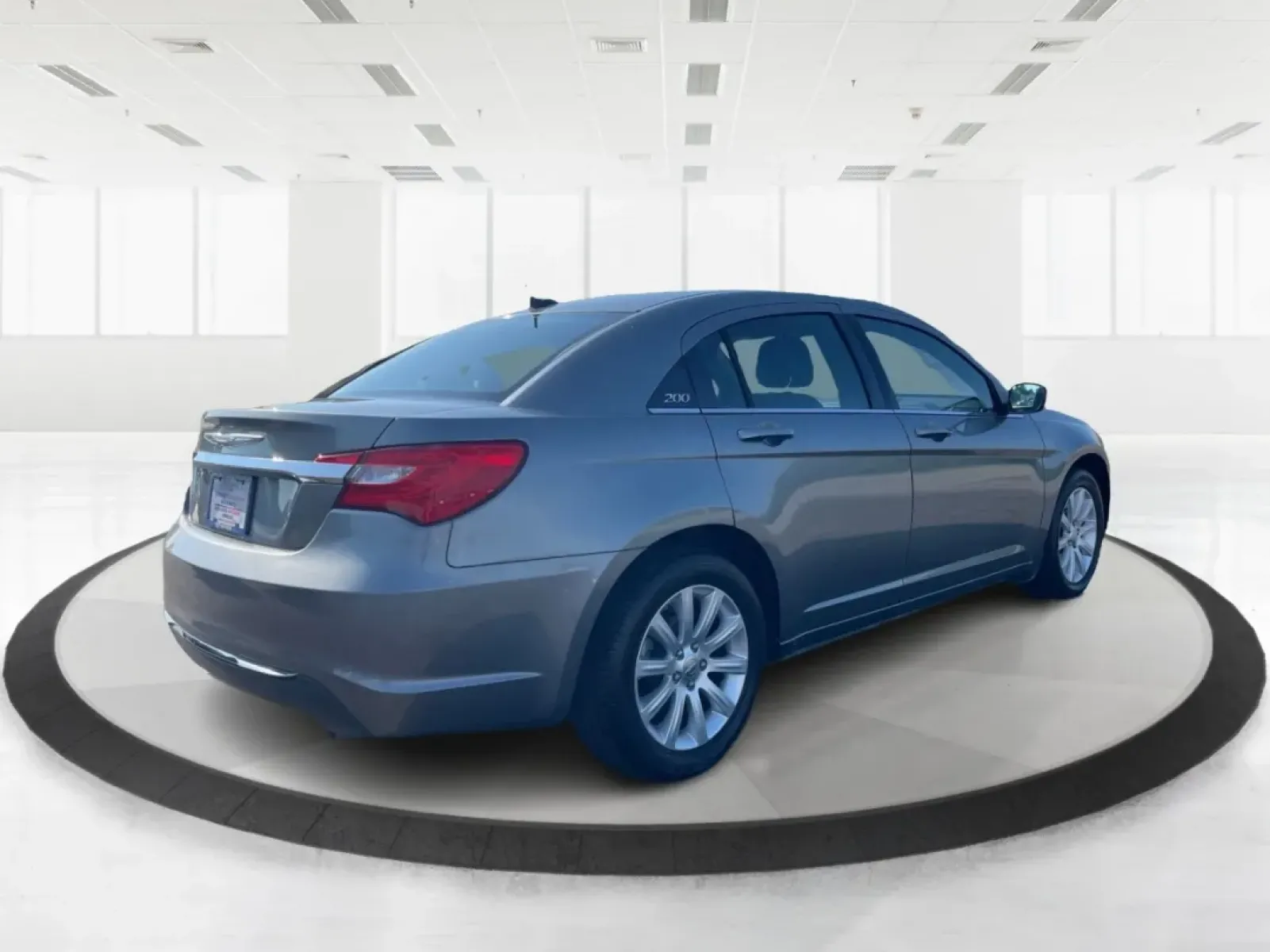 2012 Chrysler 200 Touring (1C3CCBBG5CN) with an 2.4L I-4 DOHC engine, located at 1951 S Dayton Lakeview Rd., New Carlisle, OH, 45344, (937) 908-9800, 39.890999, -84.050255 - Are you ready to elevate your driving experience? If you're seeking a reliable vehicle that perfectly balances comfort, technology, and style, look no further than the 2012 Chrysler 200 Touring sedan. This vehicle is an ideal choice for budget-conscious buyers, growing families, and anyone who wants - Photo#2