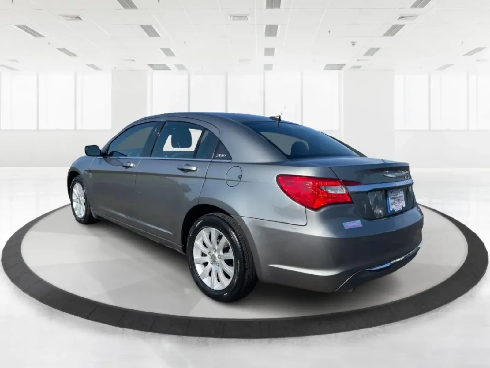 2012 Chrysler 200 Touring (1C3CCBBG5CN) with an 2.4L I-4 DOHC engine, located at 1951 S Dayton Lakeview Rd., New Carlisle, OH, 45344, (937) 908-9800, 39.890999, -84.050255 - Are you ready to elevate your driving experience? If you're seeking a reliable vehicle that perfectly balances comfort, technology, and style, look no further than the 2012 Chrysler 200 Touring sedan. This vehicle is an ideal choice for budget-conscious buyers, growing families, and anyone who wants - Photo#4