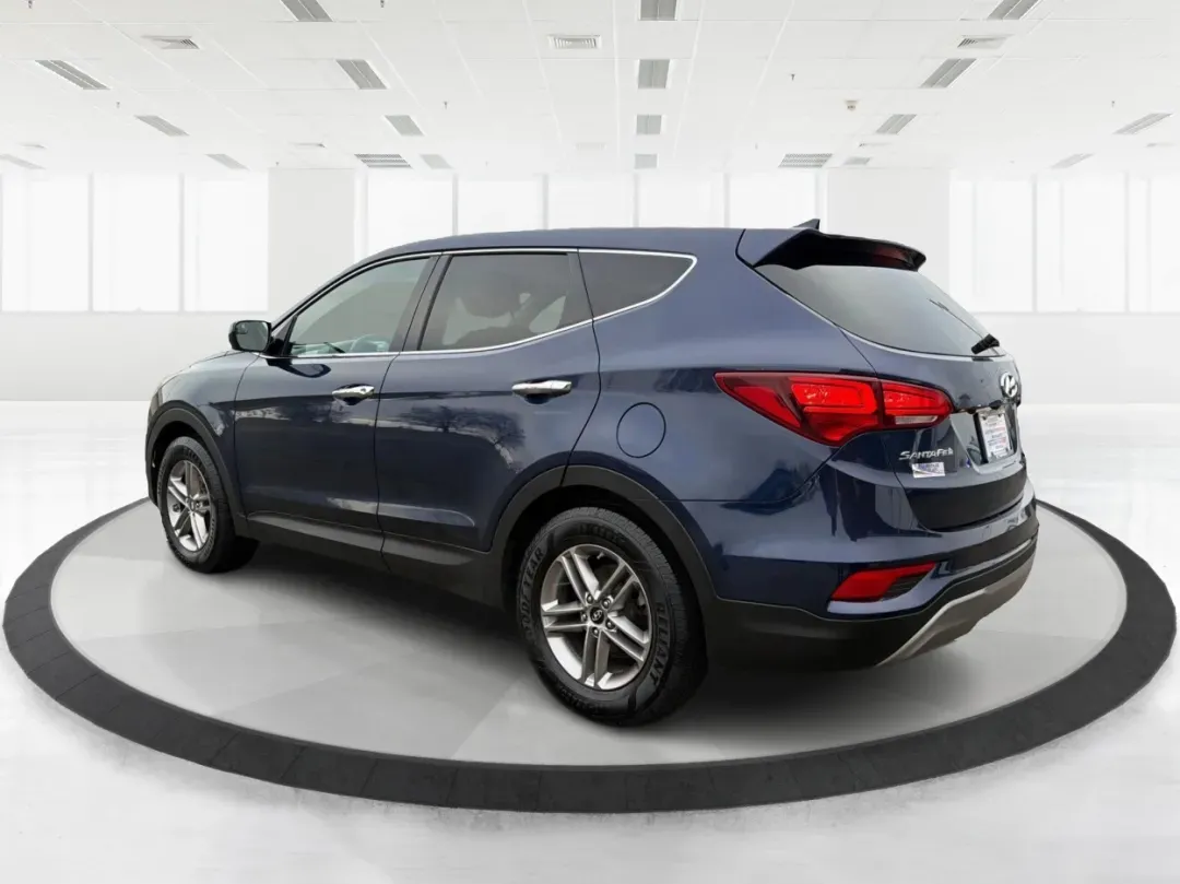 2017 Hyundai Santa Fe 2.4L (5XYZTDLB6HG) with an Theta II 2.4L I-4 gasoline direct injection engine, located at 1099 N County Rd 25A , Troy, OH, 45373, (937) 908-9800, 40.057079, -84.212883 - 2017 Hyundai Santa Fe 2.4L - Photo#4