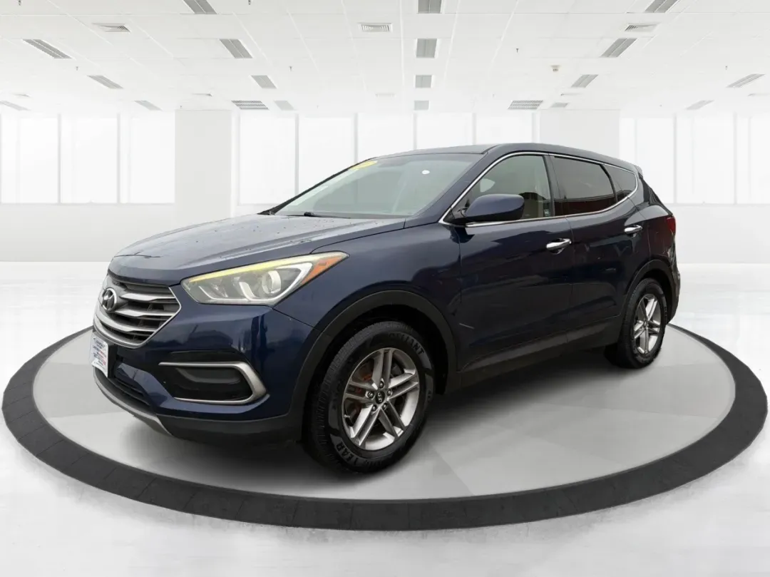 2017 Hyundai Santa Fe 2.4L (5XYZTDLB6HG) with an Theta II 2.4L I-4 gasoline direct injection engine, located at 1099 N County Rd 25A , Troy, OH, 45373, (937) 908-9800, 40.057079, -84.212883 - 2017 Hyundai Santa Fe 2.4L - Photo#8