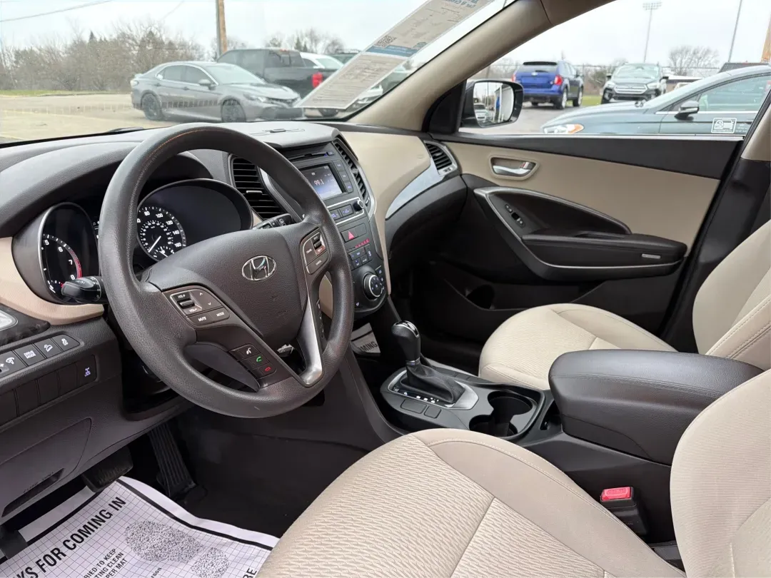 2017 Hyundai Santa Fe 2.4L (5XYZTDLB6HG) with an Theta II 2.4L I-4 gasoline direct injection engine, located at 1099 N County Rd 25A , Troy, OH, 45373, (937) 908-9800, 40.057079, -84.212883 - 2017 Hyundai Santa Fe 2.4L - Photo#9