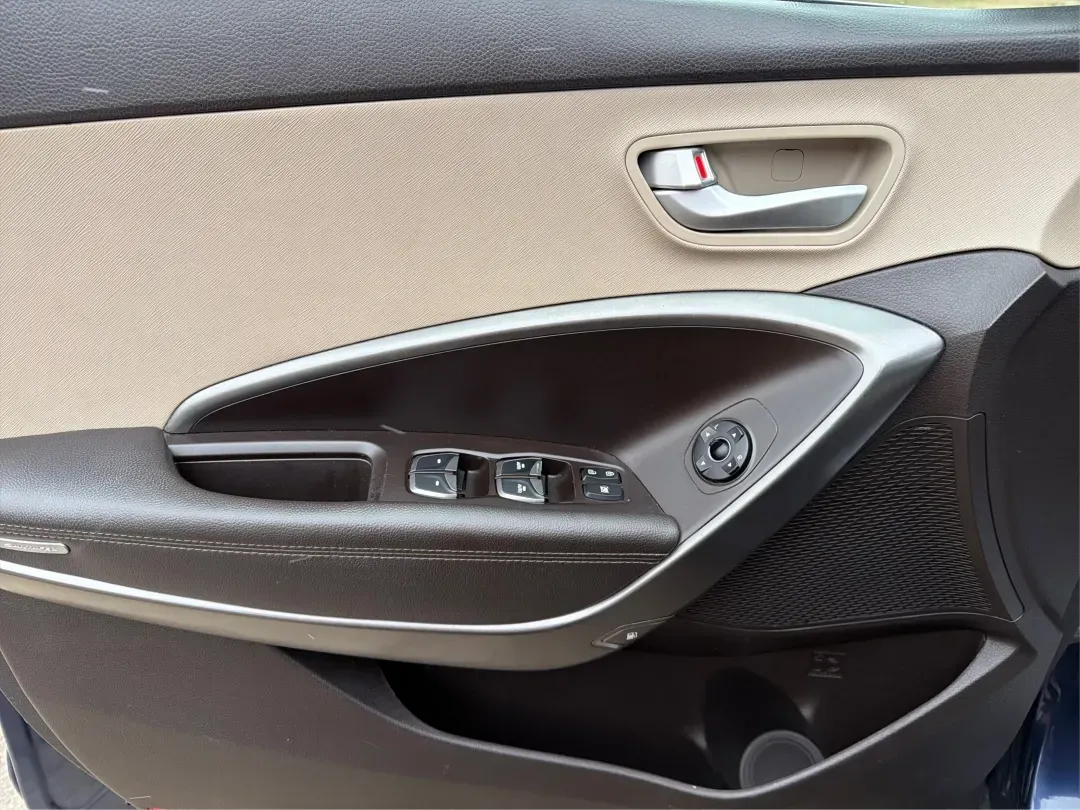 2017 Hyundai Santa Fe 2.4L (5XYZTDLB6HG) with an Theta II 2.4L I-4 gasoline direct injection engine, located at 1099 N County Rd 25A , Troy, OH, 45373, (937) 908-9800, 40.057079, -84.212883 - 2017 Hyundai Santa Fe 2.4L - Photo#17