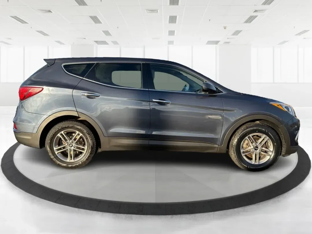 2017 Hyundai Santa Fe 2.4L (5NMZT3LBXHH) with an Theta II 2.4L I-4 gasoline direct injection engine, located at 880 E. National Road, Vandalia, OH, 45377, (937) 908-9800, 39.891918, -84.183594 - 2017 Hyundai Santa Fe 2.4L - Photo#1