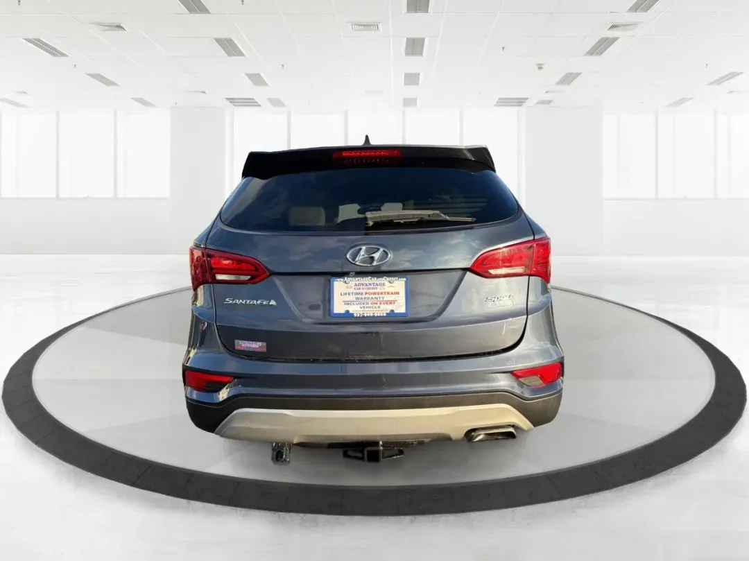 2017 Hyundai Santa Fe 2.4L (5NMZT3LBXHH) with an Theta II 2.4L I-4 gasoline direct injection engine, located at 880 E. National Road, Vandalia, OH, 45377, (937) 908-9800, 39.891918, -84.183594 - 2017 Hyundai Santa Fe 2.4L - Photo#3