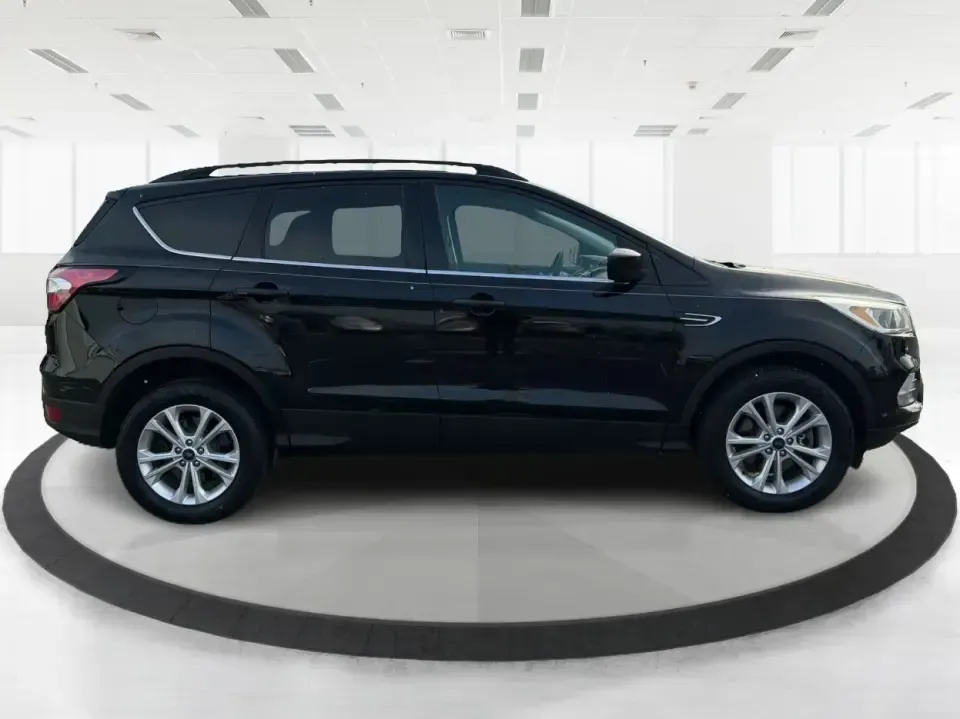 2018 Ford Escape SE (1FMCU9GD6JU) with an 1.5L L4 DOHC 16V engine, 6A transmission, located at 1184 Kauffman Ave, Fairborn, OH, 45324, (937) 908-9800, 39.807072, -84.030914 - Are you looking for the perfect vehicle that can handle your busy lifestyle while keeping you comfortable and safe? Look no further than this 2018 Ford Escape SE at Advantage Car and Credit in Piqua, OH. This versatile SUV is ideal for families on the go, weekend adventurers, and even commuters who - Photo#1