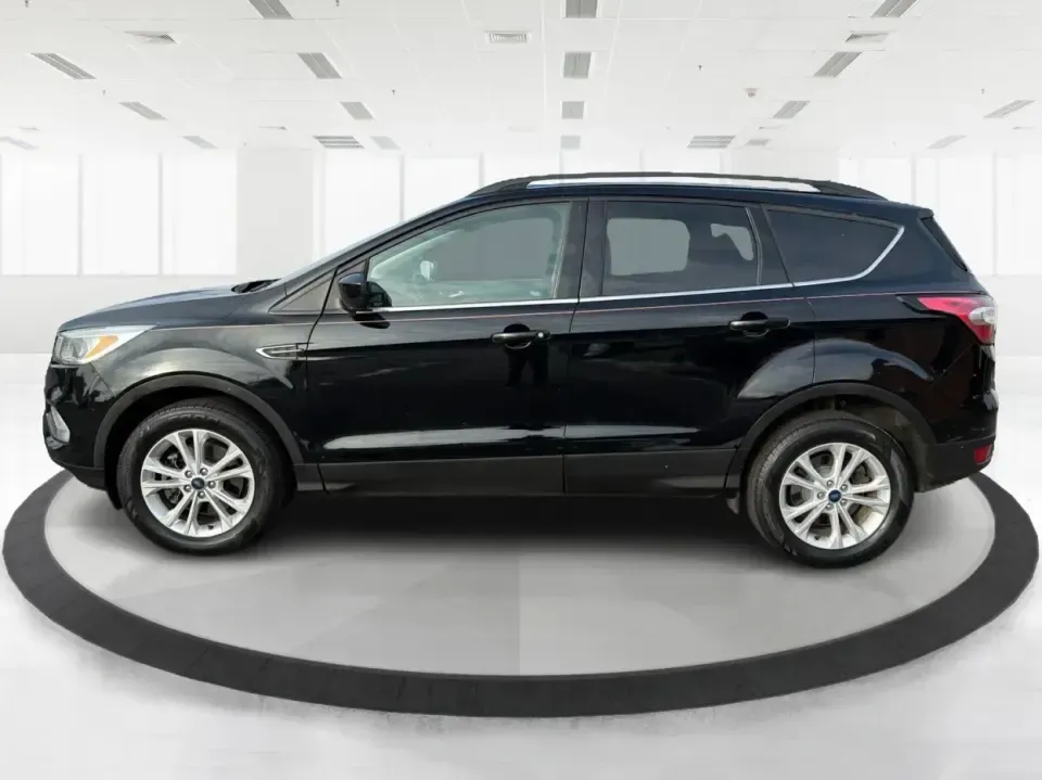 2018 Ford Escape SE (1FMCU9GD6JU) with an 1.5L L4 DOHC 16V engine, 6A transmission, located at 1184 Kauffman Ave, Fairborn, OH, 45324, (937) 908-9800, 39.807072, -84.030914 - Are you looking for the perfect vehicle that can handle your busy lifestyle while keeping you comfortable and safe? Look no further than this 2018 Ford Escape SE at Advantage Car and Credit in Piqua, OH. This versatile SUV is ideal for families on the go, weekend adventurers, and even commuters who - Photo#5