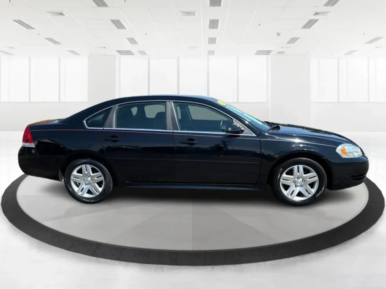 2014 Chevrolet Impala Limited LT (2G1WB5E3XE1) with an 3.6L V-6 gasoline direct injection engine, located at 1951 S Dayton Lakeview Rd., New Carlisle, OH, 45344, (937) 908-9800, 39.890999, -84.050255 - Are you ready for your next adventure, whether it's a family road trip, a daily commute, or simply running errands around Fairborn? The 2014 Chevrolet Impala Limited LT is the perfect sedan to elevate your driving experience. With its stylish black exterior and reliable performance, this vehicle is - Photo#1