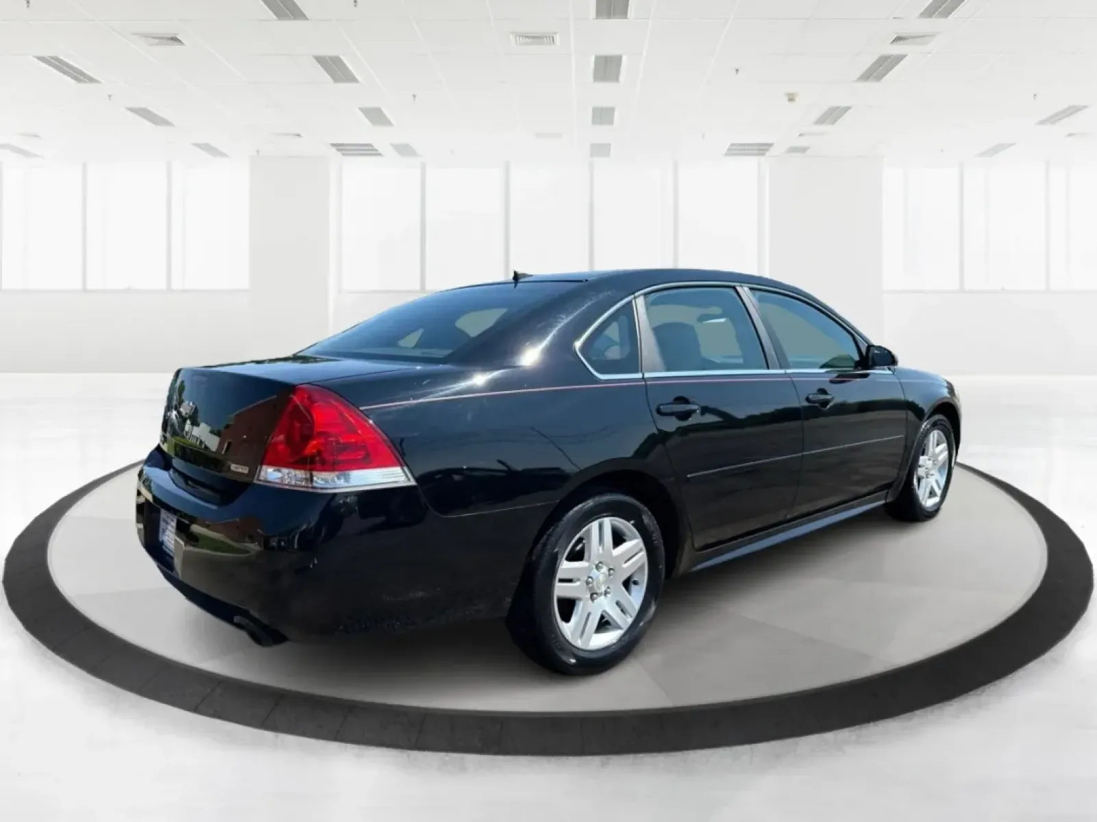 2014 Chevrolet Impala Limited LT (2G1WB5E3XE1) with an 3.6L V-6 gasoline direct injection engine, located at 1951 S Dayton Lakeview Rd., New Carlisle, OH, 45344, (937) 908-9800, 39.890999, -84.050255 - Are you ready for your next adventure, whether it's a family road trip, a daily commute, or simply running errands around Fairborn? The 2014 Chevrolet Impala Limited LT is the perfect sedan to elevate your driving experience. With its stylish black exterior and reliable performance, this vehicle is - Photo#2
