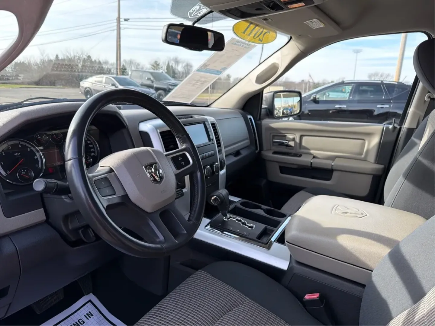 2011 Ram Ram 1500 SLT (1D7RV1GT7BS) with an HEMI 5.7L V-8 variable valve control engine, 5-Speed Automatic transmission, located at 8750 N County Rd 25A, Piqua, OH, 45356, (937) 908-9800, 40.164391, -84.232513 - **Unleash Adventure with the 2011 Ram 1500 SLT at Advantage Car and Credit - Piqua!**<br /> <br /> Are you ready to elevate your driving experience? Whether you're navigating busy city streets, embarking on weekend adventures, or tackling home improvement projects, the 2011 Ram 1500 SLT is the truck - Photo#9