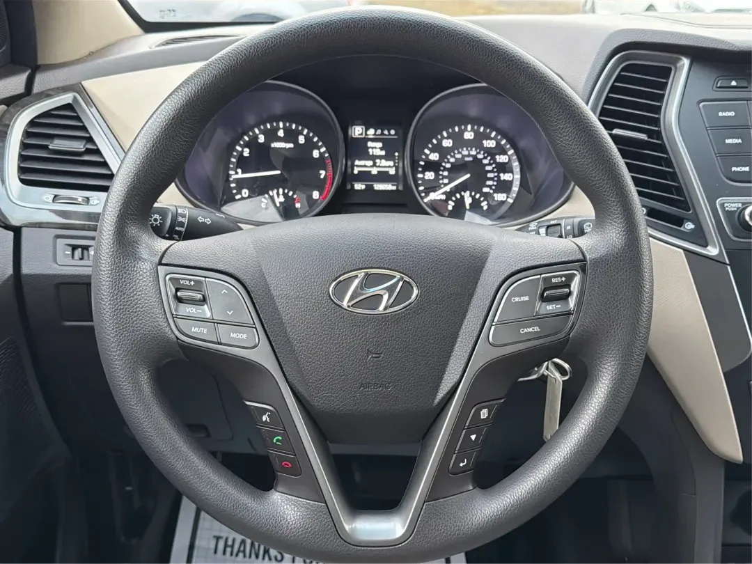 2017 Hyundai Santa Fe 2.4L (5NMZTDLB2HH) with an Theta II 2.4L I-4 gasoline direct injection engine, located at 1951 S Dayton Lakeview Rd., New Carlisle, OH, 45344, (937) 908-9800, 39.890999, -84.050255 - **Elevate Your Family Adventures with the 2017 Hyundai Santa Fe at Advantage Car and Credit!**<br /> <br /> Are you searching for the perfect vehicle to accommodate your growing family or to enhance your weekend getaways? Look no further! The 2017 Hyundai Santa Fe is a versatile and spacious SUV des - Photo#16