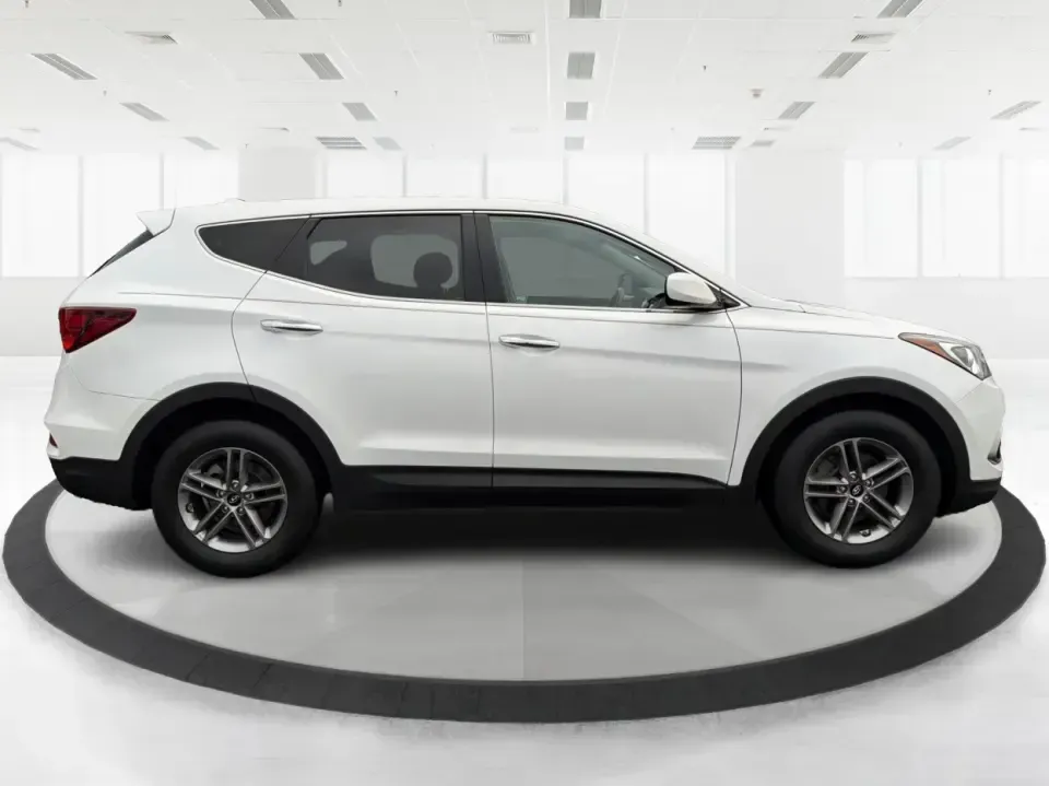2017 Hyundai Santa Fe 2.4L (5NMZTDLB2HH) with an Theta II 2.4L I-4 gasoline direct injection engine, 6A transmission, located at 4508 South Dixie Dr, Moraine, OH, 45439, (937) 908-9800, 39.689976, -84.218452 - **Elevate Your Family Adventures with the 2017 Hyundai Santa Fe at Advantage Car and Credit!**<br /> <br /> Are you searching for the perfect vehicle to accommodate your growing family or to enhance your weekend getaways? Look no further! The 2017 Hyundai Santa Fe is a versatile and spacious SUV des - Photo#1