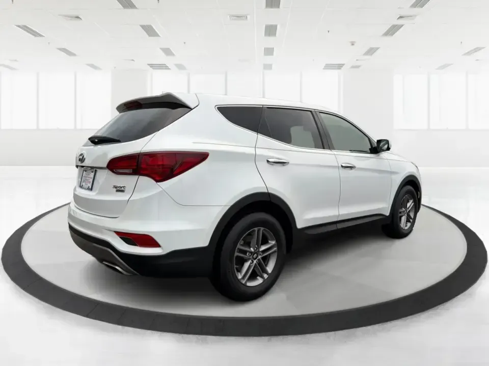 2017 Hyundai Santa Fe 2.4L (5NMZTDLB2HH) with an Theta II 2.4L I-4 gasoline direct injection engine, 6A transmission, located at 4508 South Dixie Dr, Moraine, OH, 45439, (937) 908-9800, 39.689976, -84.218452 - **Elevate Your Family Adventures with the 2017 Hyundai Santa Fe at Advantage Car and Credit!**<br /> <br /> Are you searching for the perfect vehicle to accommodate your growing family or to enhance your weekend getaways? Look no further! The 2017 Hyundai Santa Fe is a versatile and spacious SUV des - Photo#2