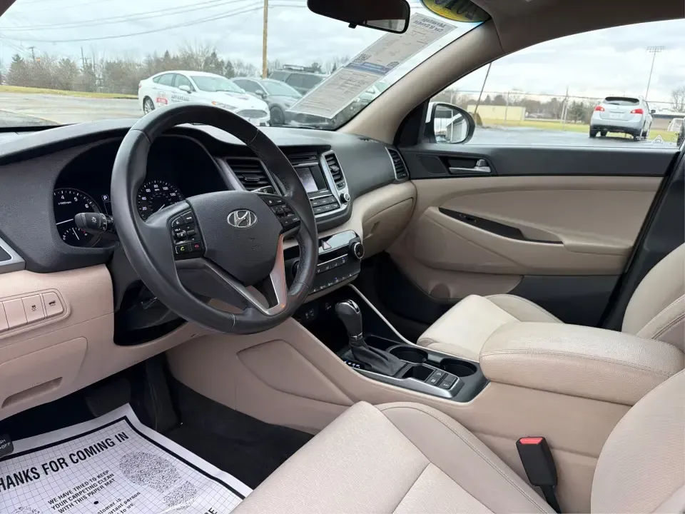 2016 Hyundai Tucson Sport (KM8J3CA26GU) with an 1.6L I-4 gasoline direct injection engine, 7A transmission, located at 1184 Kauffman Ave, Fairborn, OH, 45324, (937) 908-9800, 39.807072, -84.030914 - Discover a world of adventure with the 2016 Hyundai Tucson Sport, the perfect SUV for active families and weekend explorers alike! With its stylish Dazzling White exterior and spacious interior, this vehicle is designed for those who crave both comfort and versatility. Whether you're navigating thro - Photo#9