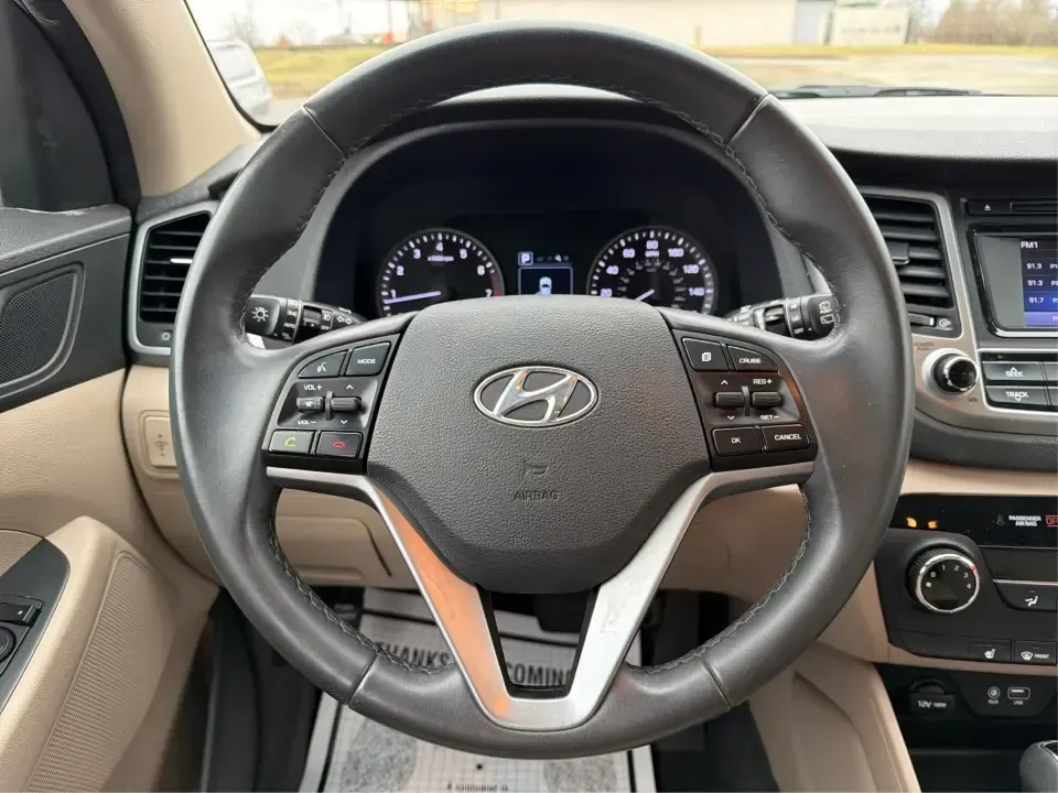 2016 Hyundai Tucson Sport (KM8J3CA26GU) with an 1.6L I-4 gasoline direct injection engine, 7A transmission, located at 1184 Kauffman Ave, Fairborn, OH, 45324, (937) 908-9800, 39.807072, -84.030914 - Discover a world of adventure with the 2016 Hyundai Tucson Sport, the perfect SUV for active families and weekend explorers alike! With its stylish Dazzling White exterior and spacious interior, this vehicle is designed for those who crave both comfort and versatility. Whether you're navigating thro - Photo#16