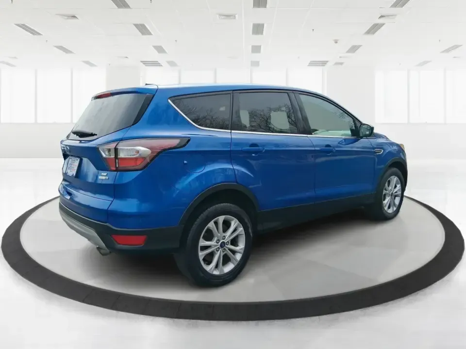 2017 Ford Escape SE 4WD (1FMCU9G93HU) with an 2.0L L4 DOHC 16V engine, 6-Speed Automatic transmission, located at 1099 N County Rd 25A , Troy, OH, 45373, (937) 908-9800, 40.057079, -84.212883 - Discover the ultimate blend of comfort, capability, and style with the 2017 Ford Escape SE 4WD, a perfect companion for families on the go or adventurers seeking their next weekend thrill. With its spacious interior and robust features, this SUV is designed for those who lead an active lifestyle, ma - Photo#2