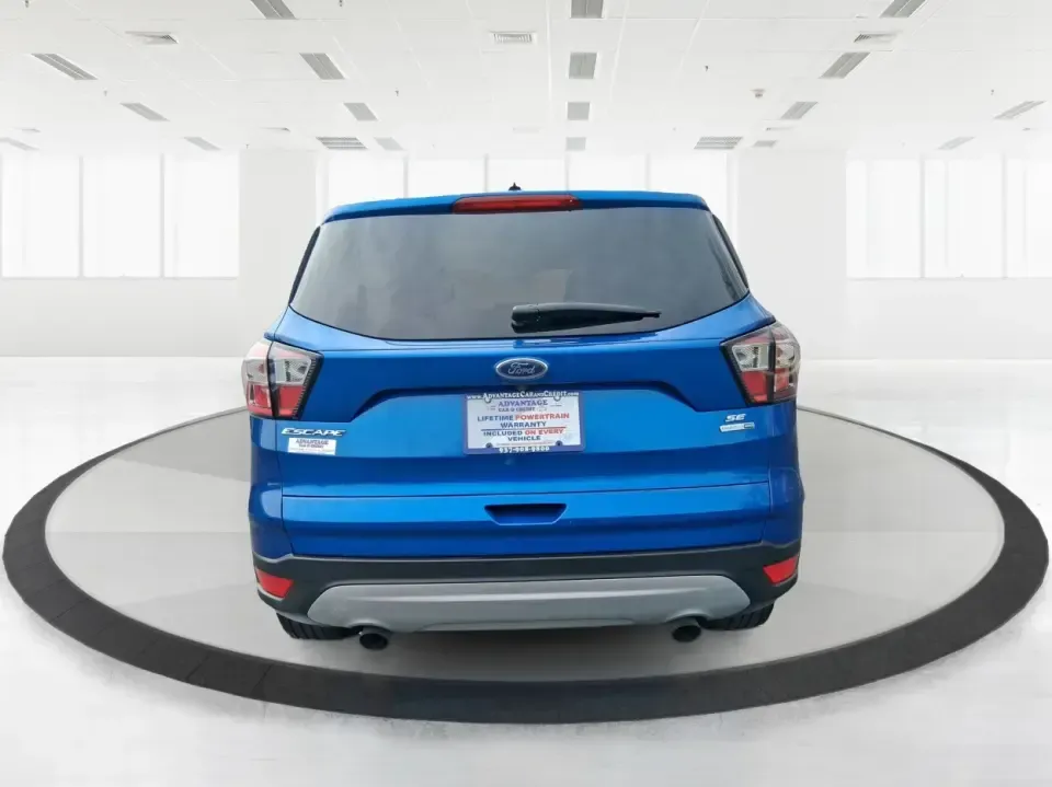 2017 Ford Escape SE 4WD (1FMCU9G93HU) with an 2.0L L4 DOHC 16V engine, 6-Speed Automatic transmission, located at 1099 N County Rd 25A , Troy, OH, 45373, (937) 908-9800, 40.057079, -84.212883 - Discover the ultimate blend of comfort, capability, and style with the 2017 Ford Escape SE 4WD, a perfect companion for families on the go or adventurers seeking their next weekend thrill. With its spacious interior and robust features, this SUV is designed for those who lead an active lifestyle, ma - Photo#3