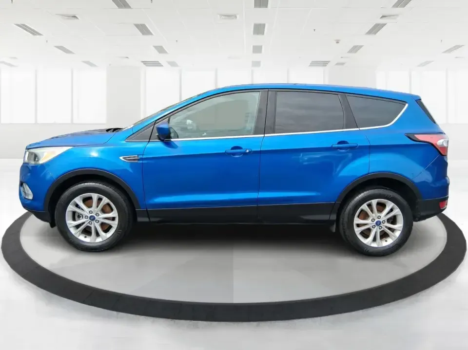 2017 Ford Escape SE 4WD (1FMCU9G93HU) with an 2.0L L4 DOHC 16V engine, 6-Speed Automatic transmission, located at 1099 N County Rd 25A , Troy, OH, 45373, (937) 908-9800, 40.057079, -84.212883 - Discover the ultimate blend of comfort, capability, and style with the 2017 Ford Escape SE 4WD, a perfect companion for families on the go or adventurers seeking their next weekend thrill. With its spacious interior and robust features, this SUV is designed for those who lead an active lifestyle, ma - Photo#5