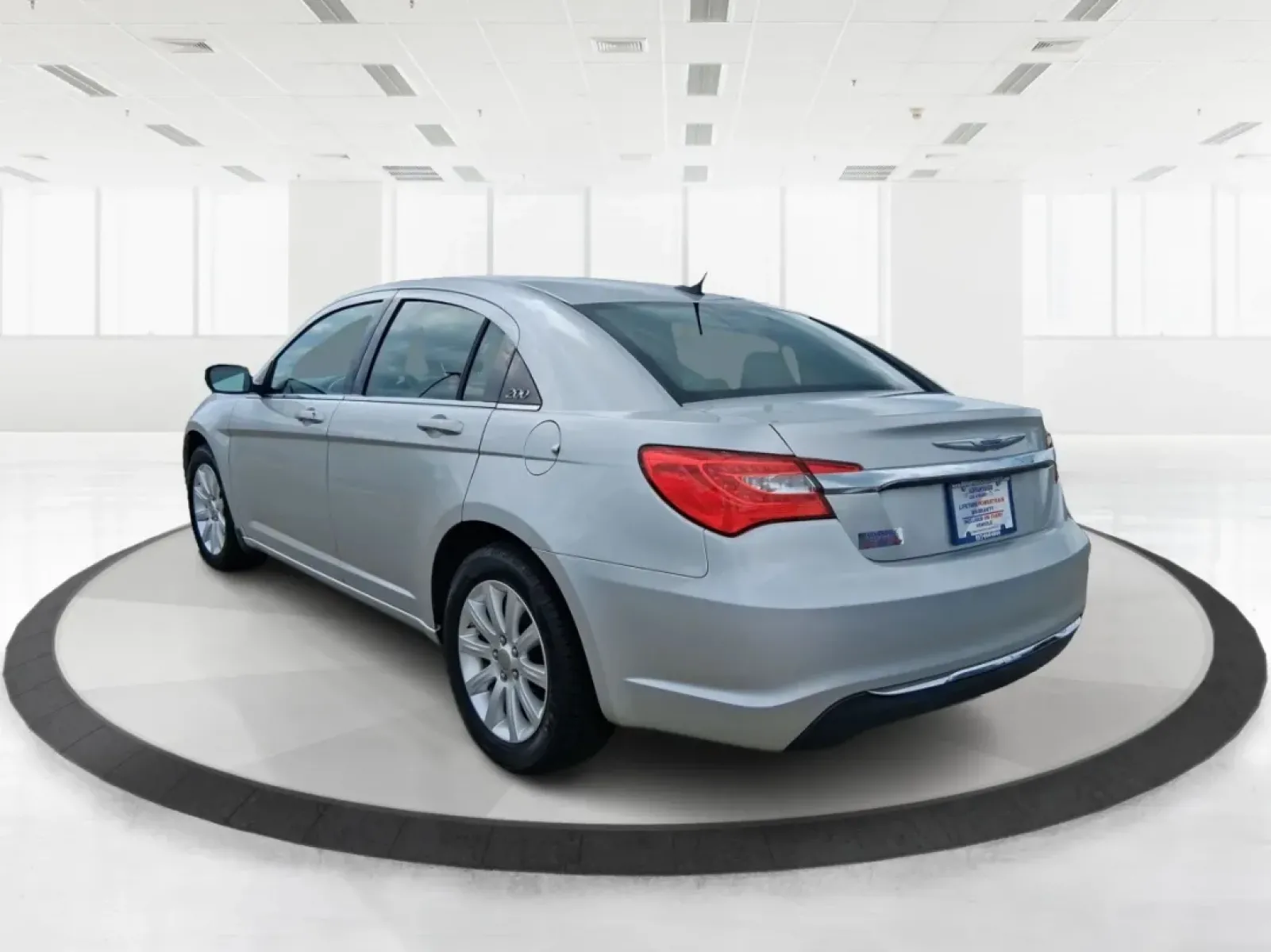 2012 Chrysler 200 Touring (1C3CCBBB9CN) with an Other engine, located at 1951 S Dayton Lakeview Rd., New Carlisle, OH, 45344, (937) 908-9800, 39.890999, -84.050255 - Experience the perfect blend of style, comfort, and versatility with this stunning 2012 Chrysler 200 Touring sedan, now available at Advantage Car and Credit in New Carlisle, OH. Whether you're a growing family seeking reliable transportation, a commuter looking for an efficient ride, or simply some - Photo#4