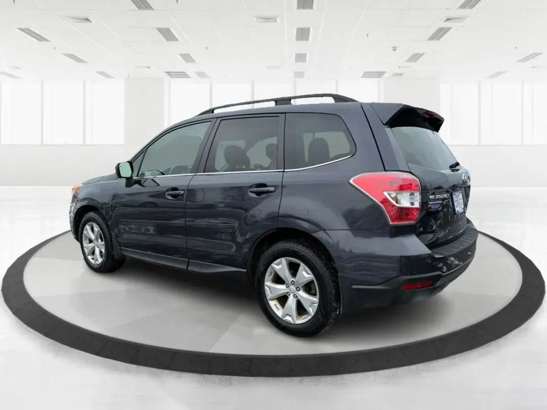 2015 Subaru Forester 2.5i Limited (JF2SJAKC0FH) with an 2.5L H-4 DOHC engine, located at 1184 Kauffman Ave, Fairborn, OH, 45324, (937) 908-9800, 39.807072, -84.030914 - Unleash your adventures with the 2015 Subaru Forester 2.5i Limited, a versatile SUV perfect for budget-conscious buyers seeking style, comfort, and capability. Whether you're planning weekend getaways in nearby Yellow Springs or commuting through Fairborn's bustling streets, this vehicle is designed - Photo#4