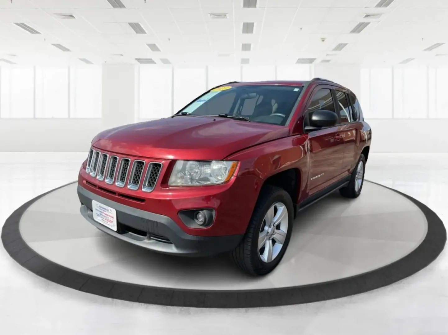 2013 Jeep Compass Latitude (1C4NJDEB6DD) with an 2.4L I-4 DOHC engine, located at 8750 N County Rd 25A, Piqua, OH, 45356, (937) 908-9800, 40.164391, -84.232513 - Are you ready to elevate your adventures and embrace a lifestyle filled with exploration? The 2013 Jeep Compass Latitude is the perfect companion for those who value versatility and comfort, making it an ideal choice for weekend getaways or daily commutes. This rugged yet refined SUV is now availabl - Photo#7