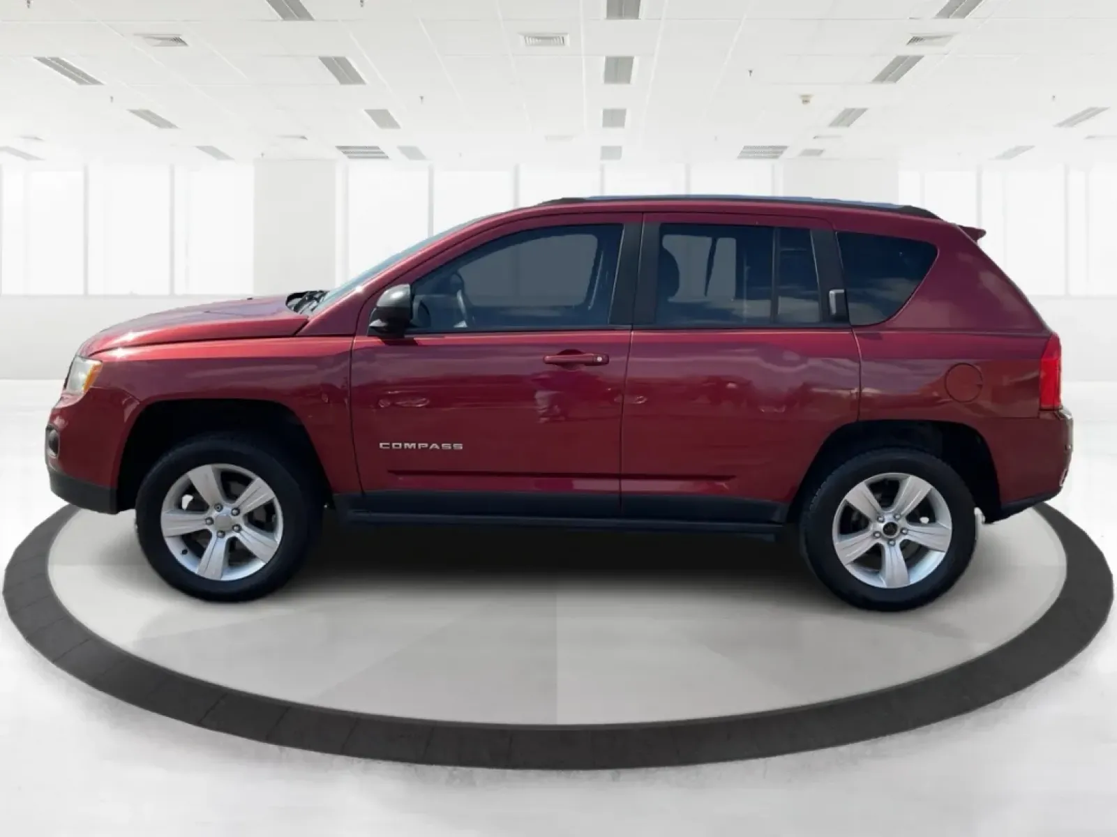 2013 Jeep Compass Latitude (1C4NJDEB6DD) with an 2.4L I-4 DOHC engine, located at 401 Woodman Dr, Riverside, OH, 45431, (937) 908-9800, 39.760899, -84.123421 - Are you ready to elevate your adventures and embrace a lifestyle filled with exploration? The 2013 Jeep Compass Latitude is the perfect companion for those who value versatility and comfort, making it an ideal choice for weekend getaways or daily commutes. This rugged yet refined SUV is now availabl - Photo#4