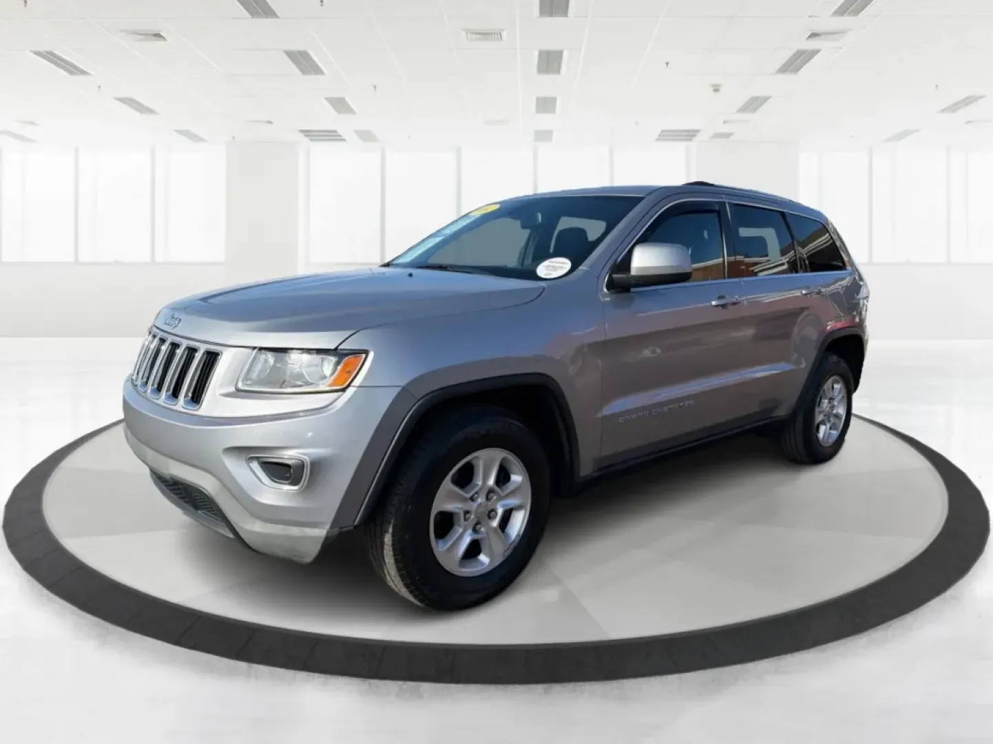 2014 Jeep Grand Cherokee Laredo (1C4RJEAG9EC) with an 3.6L V-6 DOHC engine, located at 1184 Kauffman Ave, Fairborn, OH, 45324, (937) 908-9800, 39.807072, -84.030914 - **Elevate Your Adventures with the 2014 Jeep Grand Cherokee Laredo!**<br /> <br /> Are you ready to take your family on unforgettable road trips or tackle weekend adventures like never before? The 2014 Jeep Grand Cherokee Laredo is designed for those who crave exploration and comfort in equal measur - Photo#8