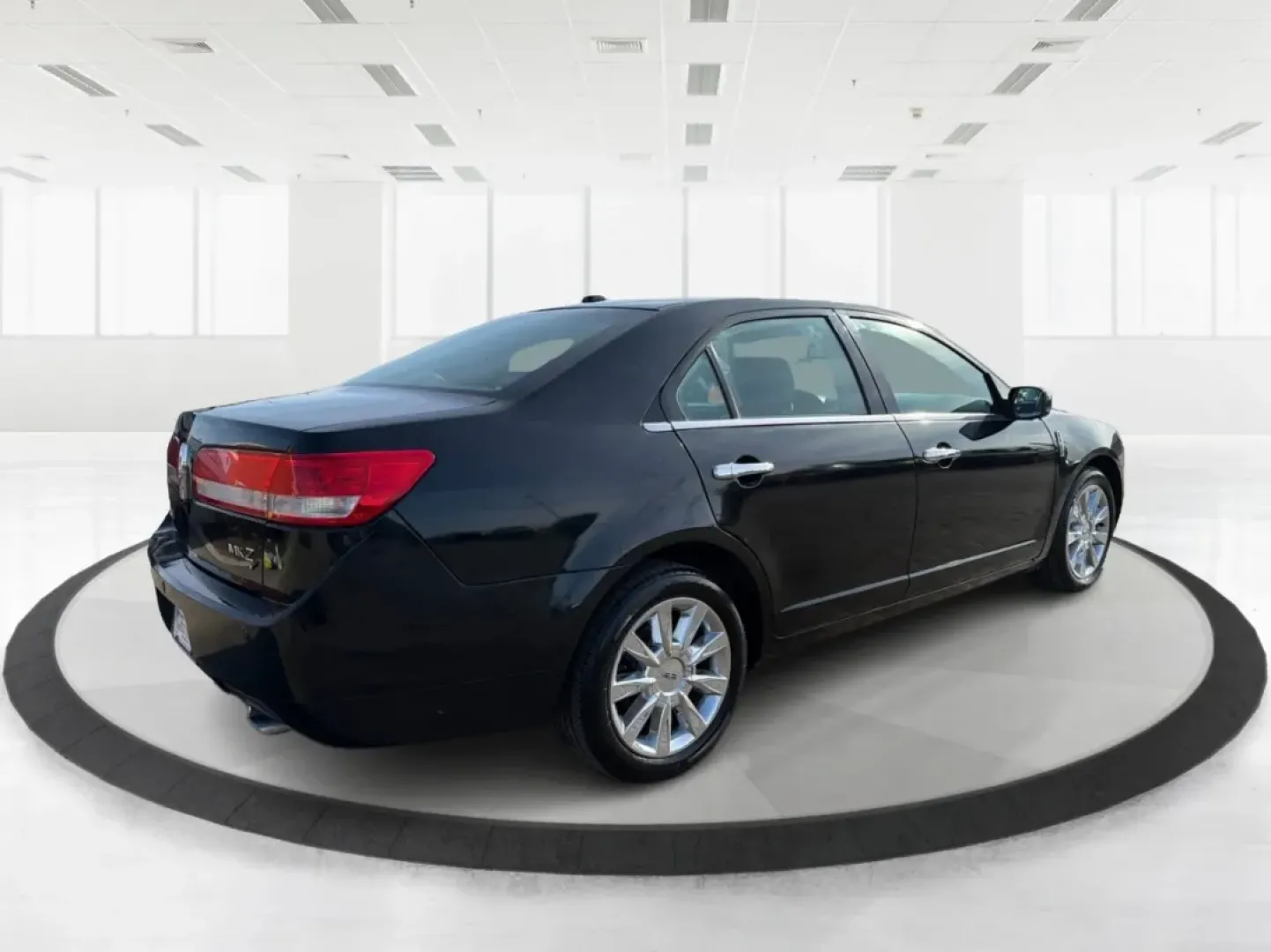 2011 Lincoln MKZ Base (3LNHL2GC5BR) with an 3.5L V6 DOHC 24V engine, 6-Speed Automatic transmission, located at 401 Woodman Dr, Riverside, OH, 45431, (937) 908-9800, 39.760899, -84.123421 - **Elevate Your Commute with the 2011 Lincoln MKZ at Advantage Car and Credit - Riverside!**<br /> <br /> Ready to transform your daily drive into a luxurious experience? The 2011 Lincoln MKZ is the perfect vehicle for those seeking comfort without compromising on style. With its sleek black exterior - Photo#2