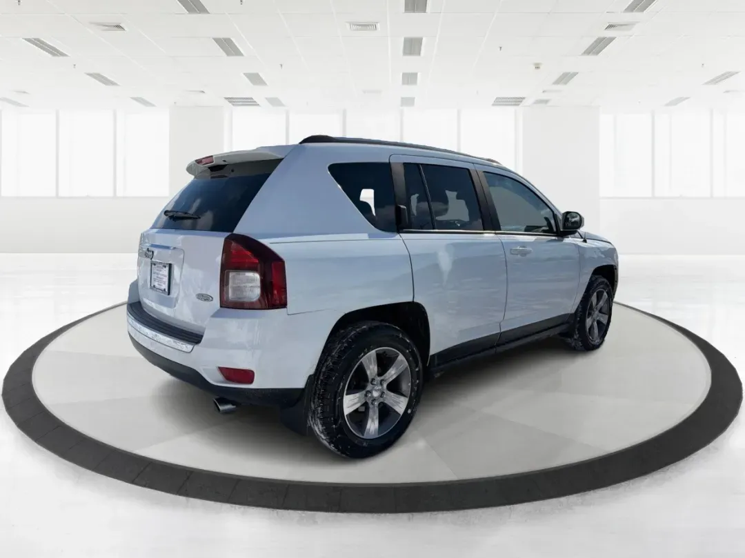 2016 Jeep Compass High Altitude Edition (1C4NJDEB4GD) with an 2.4L I-4 DOHC engine, 6A transmission, located at 4508 South Dixie Dr, Moraine, OH, 45439, (937) 908-9800, 39.689976, -84.218452 - ### Get Ready for Your Next Adventure with the 2016 Jeep Compass High Altitude Edition!<br /> <br /> Are you an adventure seeker or a weekend warrior? The 2016 Jeep Compass High Altitude Edition is the perfect vehicle to elevate your lifestyle! Ideal for those who love hitting the trails or simply r - Photo#2