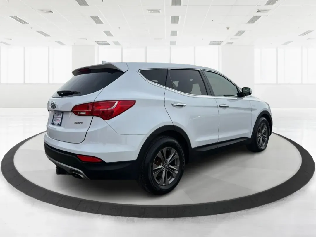 2013 Hyundai Santa Fe Sport (5XYZT3LB2DG) with an Theta II 2.4L I-4 gasoline direct injection engine, 6-Speed Automatic transmission, located at 1184 Kauffman Ave, Fairborn, OH, 45324, (937) 908-9800, 39.807072, -84.030914 - **Adventure Awaits: Drive the 2013 Hyundai Santa Fe Sport in Fairborn, OH!**<br /> <br /> Are you ready to elevate your lifestyle while enjoying the freedom of the open road? Look no further than the stunning 2013 Hyundai Santa Fe Sport, available now at Advantage Car and Credit in Fairborn, OH! Thi - Photo#2