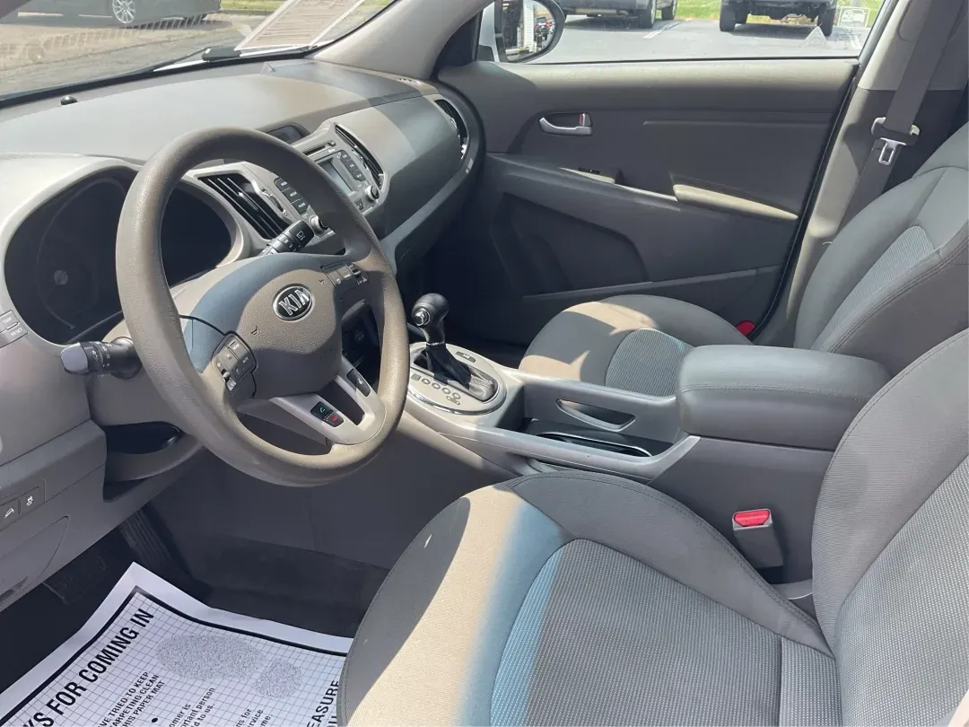 2016 Kia Sportage LX (KNDPBCACXG7) with an Theta II 2.4L I-4 gasoline direct injection engine, located at 1230 East Main St, Xenia, OH, 45385, (937) 908-9800, 39.688026, -83.910172 - Embrace the journey of life with the 2016 Kia Sportage LX, a vehicle designed for those who thrive on adventure and seek comfort in their daily commute. Whether you're navigating the bustling streets of Fairborn, OH, or embarking on a weekend family getaway, this versatile crossover is your perfect - Photo#9