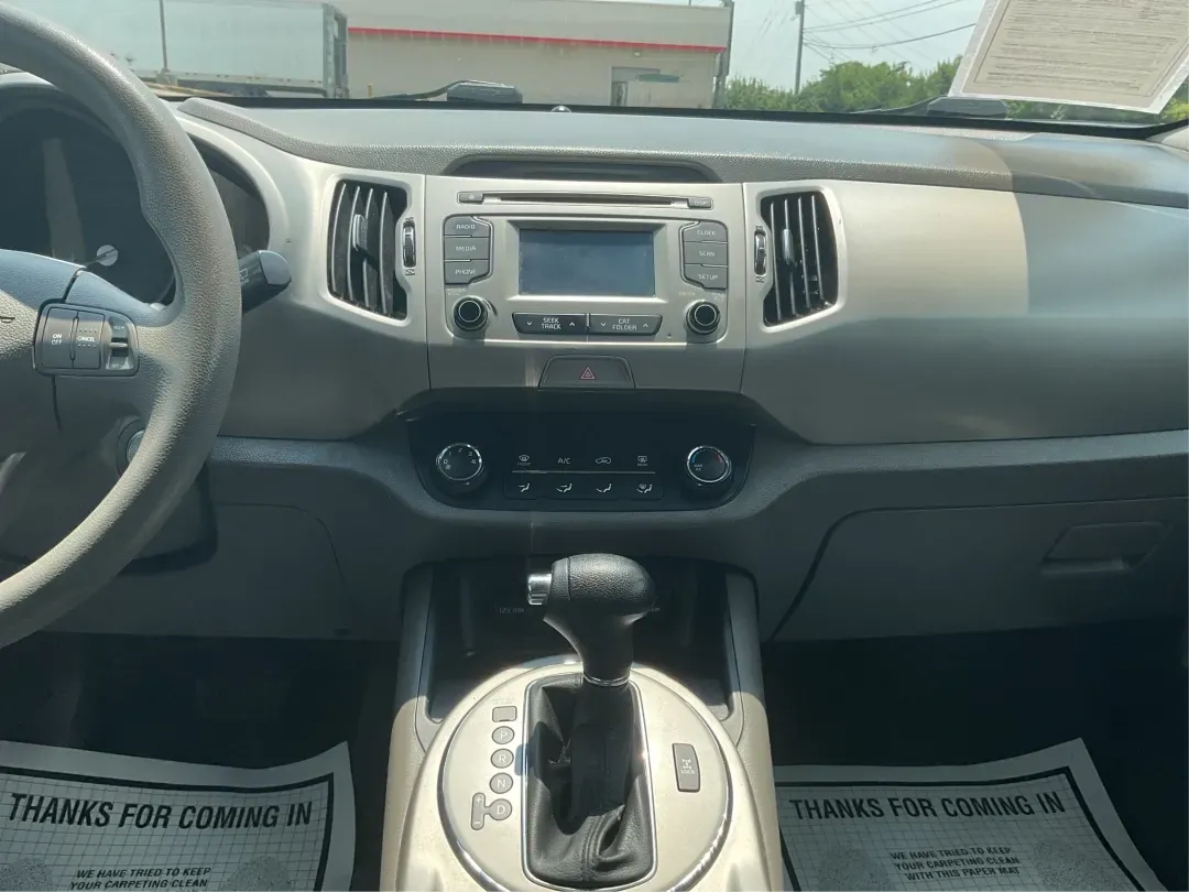 2016 Kia Sportage LX (KNDPBCACXG7) with an Theta II 2.4L I-4 gasoline direct injection engine, located at 1230 East Main St, Xenia, OH, 45385, (937) 908-9800, 39.688026, -83.910172 - Embrace the journey of life with the 2016 Kia Sportage LX, a vehicle designed for those who thrive on adventure and seek comfort in their daily commute. Whether you're navigating the bustling streets of Fairborn, OH, or embarking on a weekend family getaway, this versatile crossover is your perfect - Photo#13