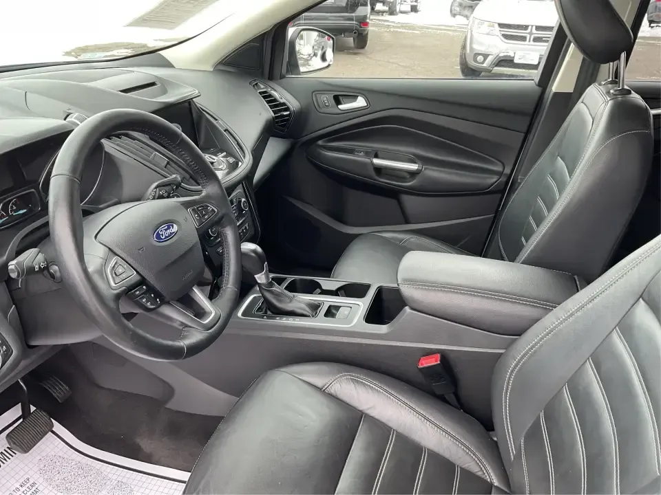 2018 Ford Escape Titanium (1FMCU9J97JU) with an EcoBoost 2L I-4 gasoline direct injection engine, 6A transmission, located at 8750 N County Rd 25A, Piqua, OH, 45356, (937) 908-9800, 40.164391, -84.232513 - Need an SUV that can handle Ohio weather, daily commutes, and weekend getaways without feeling like a compromise? This 2018 Ford Escape Titanium 4WD in Ingot Silver Metallic is built for real life in Troy-whether you're shuttling kids across town, driving a long commute down I-75, or loading up for - Photo#9