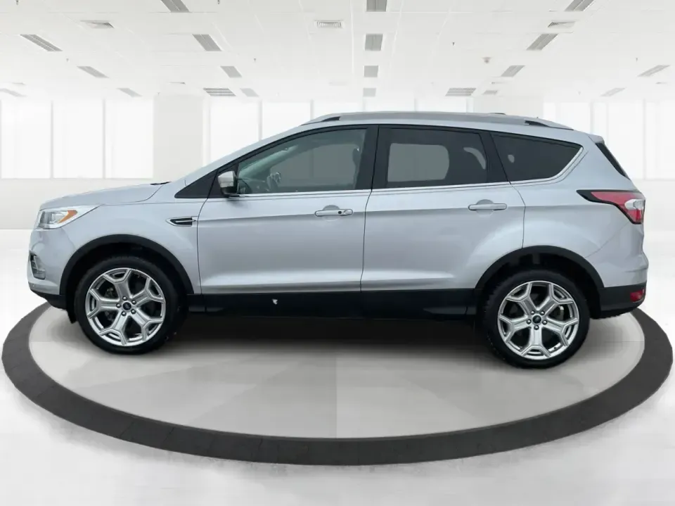 2018 Ford Escape Titanium (1FMCU9J97JU) with an EcoBoost 2L I-4 gasoline direct injection engine, 6A transmission, located at 1230 East Main St, Xenia, OH, 45385, (937) 908-9800, 39.688026, -83.910172 - Need an SUV that can handle Ohio weather, daily commutes, and weekend getaways without feeling like a compromise? This 2018 Ford Escape Titanium 4WD in Ingot Silver Metallic is built for real life in Troy-whether you're shuttling kids across town, driving a long commute down I-75, or loading up for - Photo#5
