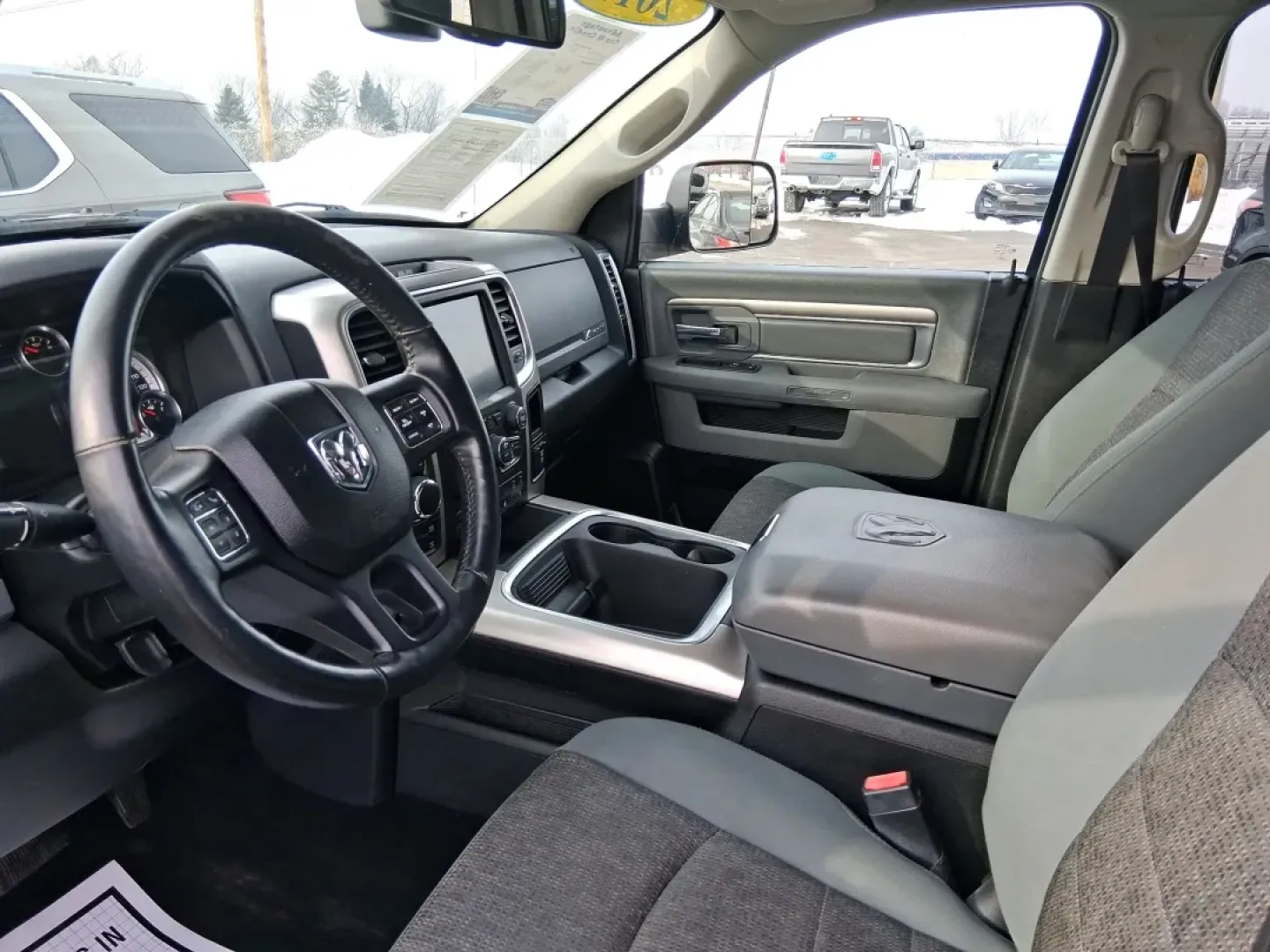 2017 Ram 1500 Big Horn Quad Cab 4x4 6'4 Box (1C6RR7GT3HS) with an 5.7L V8 OHV 16V engine, 8A transmission, located at 8750 N County Rd 25A, Piqua, OH, 45356, (937) 908-9800, 40.164391, -84.232513 - Need a truck that can handle Ohio winters, weekend projects, and the kind of road trips that start with a full cooler and end at Indian Lake? This 2017 Ram 1500 Big Horn Quad Cab 4x4 is built for real life-commuters who want confidence in bad weather, families who need space for everyone's gear, and - Photo#9