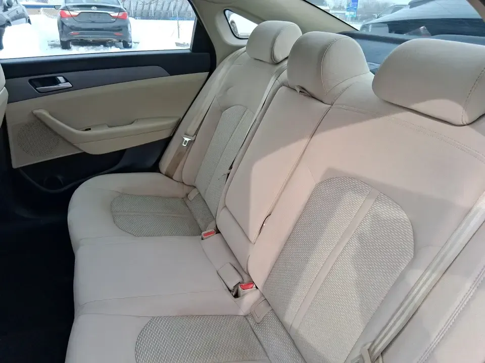 2016 Hyundai Sonata SE (5NPE24AF9GH) with an 2.4L I-4 gasoline direct injection engine, 7A transmission, located at 4508 South Dixie Dr, Moraine, OH, 45439, (937) 908-9800, 39.689976, -84.218452 - Need a dependable daily driver that can handle the school run, the I-75 commute, and the occasional weekend getaway without draining your budget? This 2016 Hyundai Sonata SE in rich Dark Truffle is the kind of comfortable, efficient sedan that fits real life in Vandalia-easy to park, smooth on longe - Photo#10