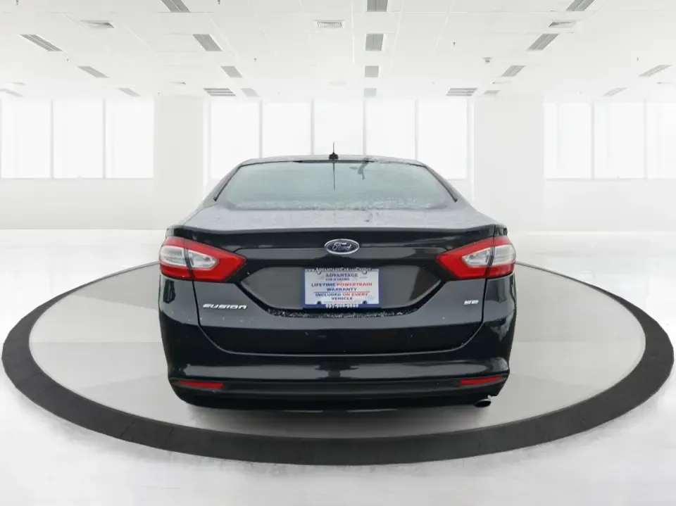 2014 Ford Fusion SE (1FA6P0H77E5) with an 2.5L L4 DOHC 16V engine, Automatic transmission, located at 880 E. National Road, Vandalia, OH, 45377, (937) 908-9800, 39.891918, -84.183594 - Need a dependable sedan for the daily commute up I75, school drop-offs around Vandalia-Butler City Schools, and comfortable weekend drives to the National Museum of the U.S. Air Force? This 2014 Ford Fusion SE is built for real life-smooth on longer stretches of E. National Road, easy to park for er - Photo#3