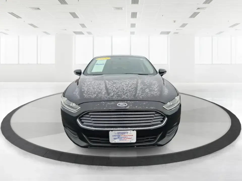 2014 Ford Fusion SE (1FA6P0H77E5) with an 2.5L L4 DOHC 16V engine, Automatic transmission, located at 880 E. National Road, Vandalia, OH, 45377, (937) 908-9800, 39.891918, -84.183594 - Need a dependable sedan for the daily commute up I75, school drop-offs around Vandalia-Butler City Schools, and comfortable weekend drives to the National Museum of the U.S. Air Force? This 2014 Ford Fusion SE is built for real life-smooth on longer stretches of E. National Road, easy to park for er - Photo#7