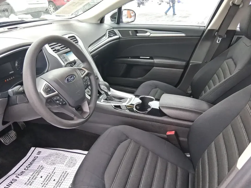 2014 Ford Fusion SE (1FA6P0H77E5) with an 2.5L L4 DOHC 16V engine, Automatic transmission, located at 880 E. National Road, Vandalia, OH, 45377, (937) 908-9800, 39.891918, -84.183594 - Need a dependable sedan for the daily commute up I75, school drop-offs around Vandalia-Butler City Schools, and comfortable weekend drives to the National Museum of the U.S. Air Force? This 2014 Ford Fusion SE is built for real life-smooth on longer stretches of E. National Road, easy to park for er - Photo#9