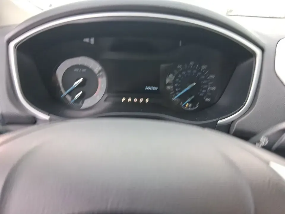 2014 Ford Fusion SE (1FA6P0H77E5) with an 2.5L L4 DOHC 16V engine, Automatic transmission, located at 880 E. National Road, Vandalia, OH, 45377, (937) 908-9800, 39.891918, -84.183594 - Need a dependable sedan for the daily commute up I75, school drop-offs around Vandalia-Butler City Schools, and comfortable weekend drives to the National Museum of the U.S. Air Force? This 2014 Ford Fusion SE is built for real life-smooth on longer stretches of E. National Road, easy to park for er - Photo#16