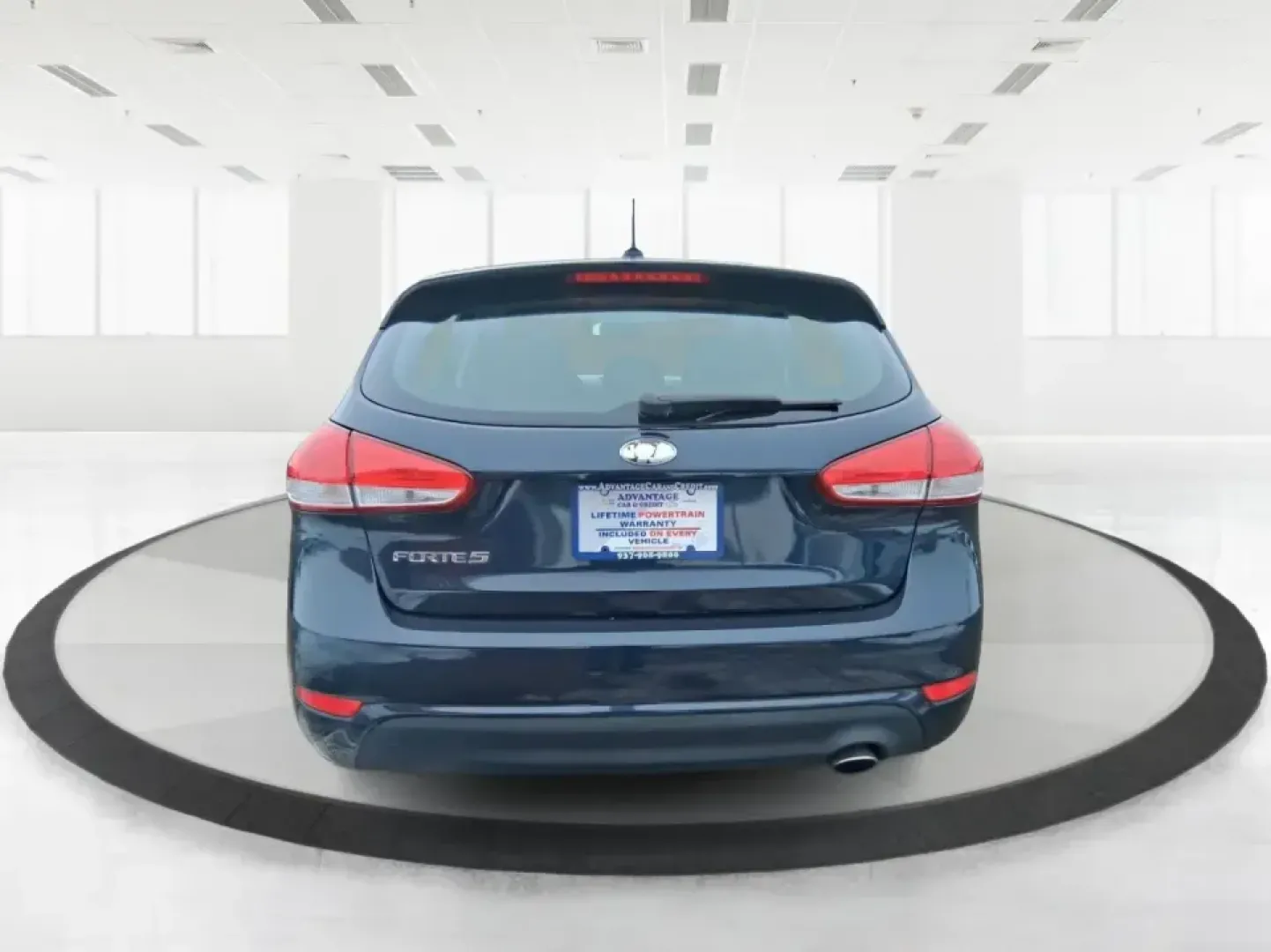 2018 Kia Forte LX (KNAFK5A89J5) with an 2L I-4 DOHC engine, 6A transmission, located at 8750 N County Rd 25A, Piqua, OH, 45356, (937) 908-9800, 40.164391, -84.232513 - Need a smart, budget-friendly ride that can handle daily commutes to Dayton, quick grocery runs, and spontaneous weekend trips without feeling cramped? This 2018 Kia Forte LX Hatchback in Gravity Blue is built for real-life driving in and around New Carlisle-easy to park, efficient to live with, and - Photo#3