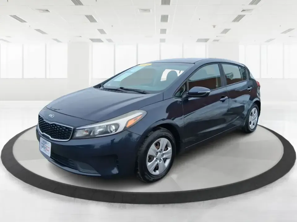 2018 Kia Forte LX (KNAFK5A89J5) with an 2L I-4 DOHC engine, 6A transmission, located at 8750 N County Rd 25A, Piqua, OH, 45356, (937) 908-9800, 40.164391, -84.232513 - Need a smart, budget-friendly ride that can handle daily commutes to Dayton, quick grocery runs, and spontaneous weekend trips without feeling cramped? This 2018 Kia Forte LX Hatchback in Gravity Blue is built for real-life driving in and around New Carlisle-easy to park, efficient to live with, and - Photo#8