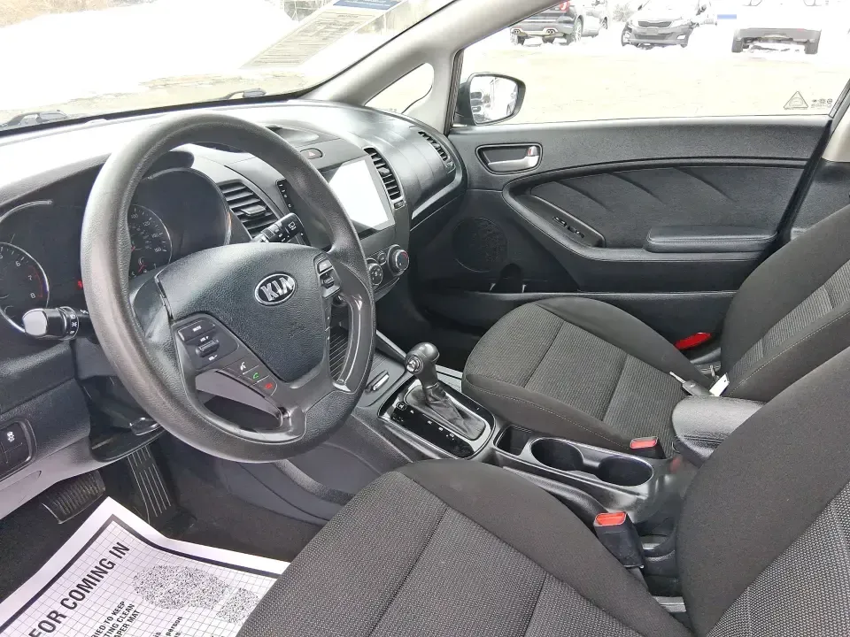 2018 Kia Forte LX (KNAFK5A89J5) with an 2L I-4 DOHC engine, 6A transmission, located at 8750 N County Rd 25A, Piqua, OH, 45356, (937) 908-9800, 40.164391, -84.232513 - Need a smart, budget-friendly ride that can handle daily commutes to Dayton, quick grocery runs, and spontaneous weekend trips without feeling cramped? This 2018 Kia Forte LX Hatchback in Gravity Blue is built for real-life driving in and around New Carlisle-easy to park, efficient to live with, and - Photo#9