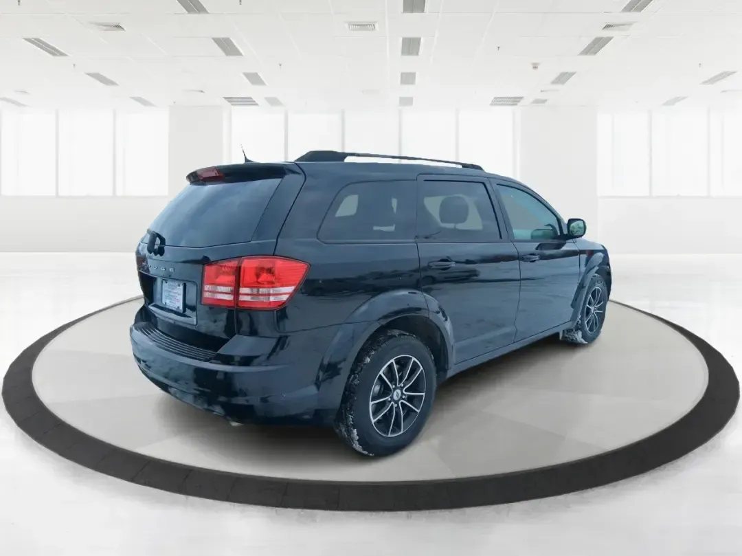 2018 Dodge Journey SE (3C4PDCAB9JT) with an Tigershark MultiAir 2.4L I-4 DOHC engine, 4A transmission, located at 880 E. National Road, Vandalia, OH, 45377, (937) 908-9800, 39.891918, -84.183594 - Need a practical SUV that can handle school drop-offs, grocery runs, and weekend trips up I75 without blowing your budget? This 2018 Dodge Journey SE in Pitch Black Clearcoat is built for real life in West Central Ohio-roomy enough for growing families, comfortable for long commutes, and flexible fo - Photo#2