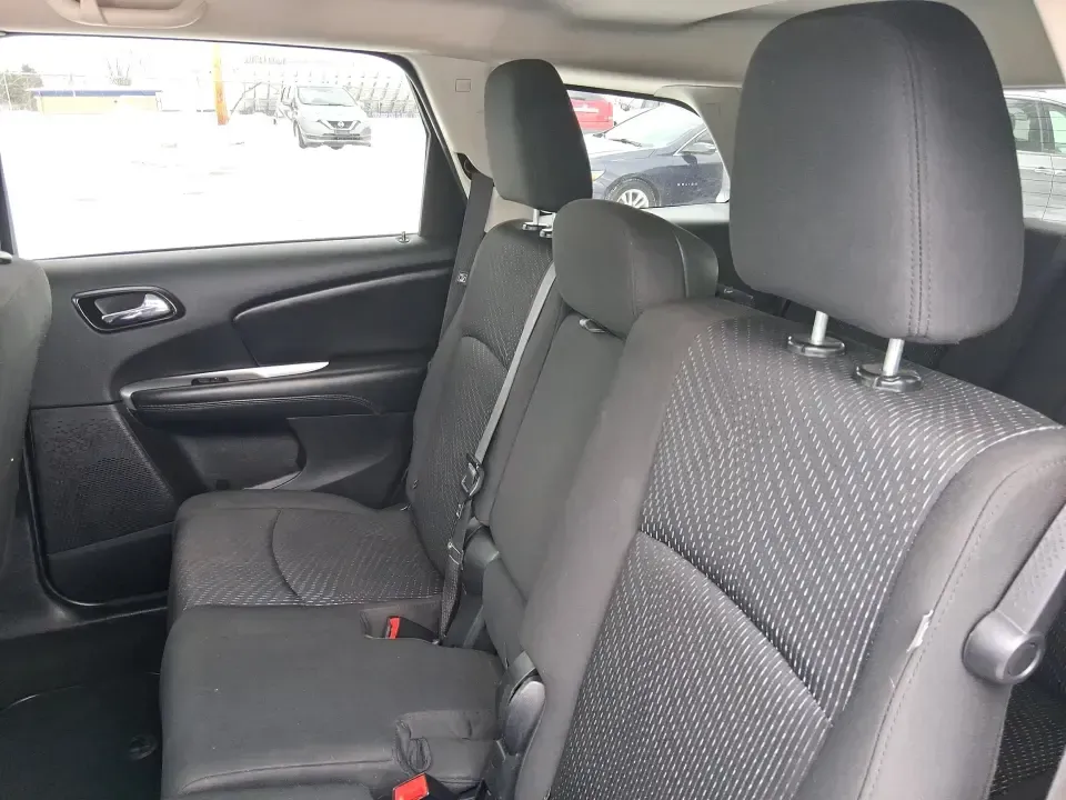 2018 Dodge Journey SE (3C4PDCAB9JT) with an Tigershark MultiAir 2.4L I-4 DOHC engine, 4A transmission, located at 880 E. National Road, Vandalia, OH, 45377, (937) 908-9800, 39.891918, -84.183594 - Need a practical SUV that can handle school drop-offs, grocery runs, and weekend trips up I75 without blowing your budget? This 2018 Dodge Journey SE in Pitch Black Clearcoat is built for real life in West Central Ohio-roomy enough for growing families, comfortable for long commutes, and flexible fo - Photo#9